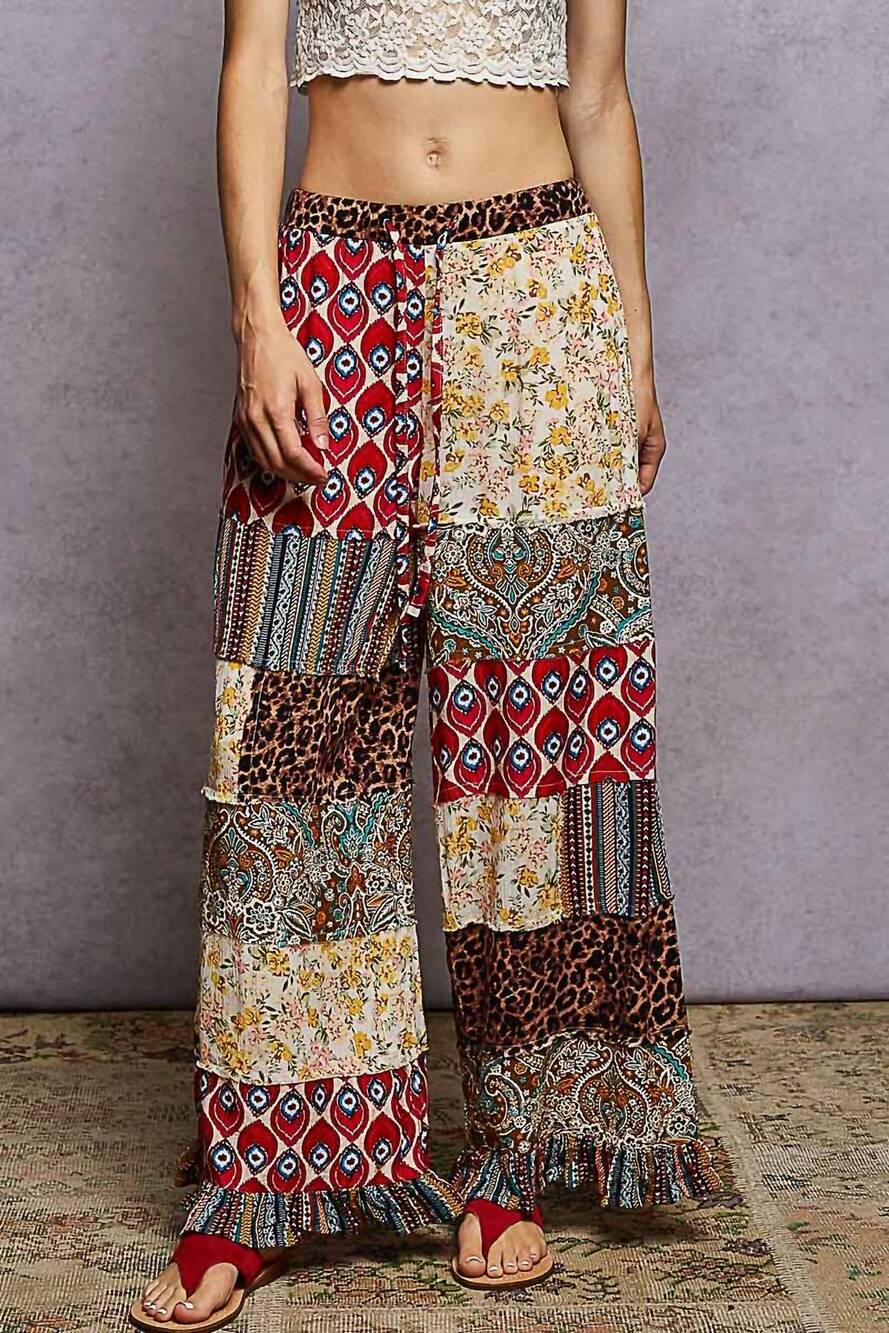 NEW POL floral flare pants in red multi